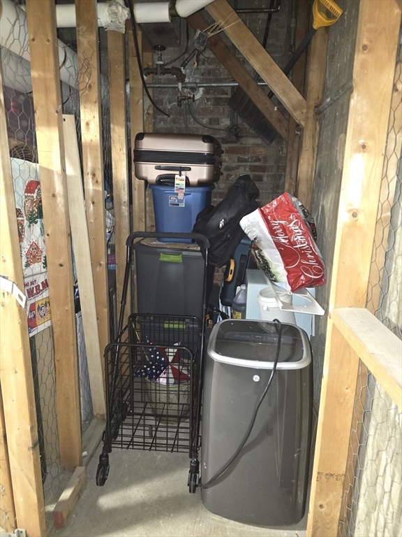 354 North Main Street, Unit 214 Andover, MA 01810 - Photo 23 of 33 a utility room with dryer and washer
