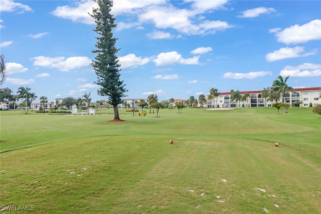 9 High Point Circle North, Unit 102 Naples, FL 34103 - Photo 33 of 48 a view of an ocean and city