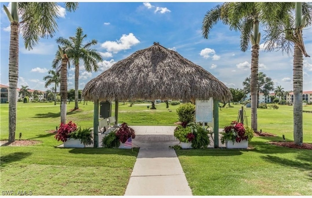 9 High Point Circle North, Unit 102 Naples, FL 34103 - Photo 45 of 48 a view of a park with palm trees