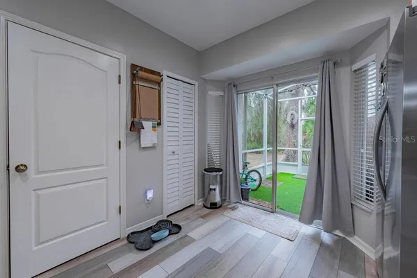 a view of an entryway with a hardwood floor