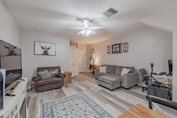 a living room with furniture and a couch