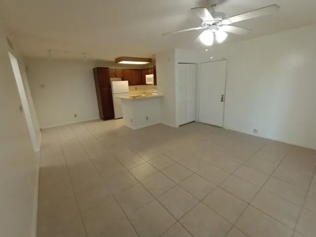 a view of a kitchen with a sink