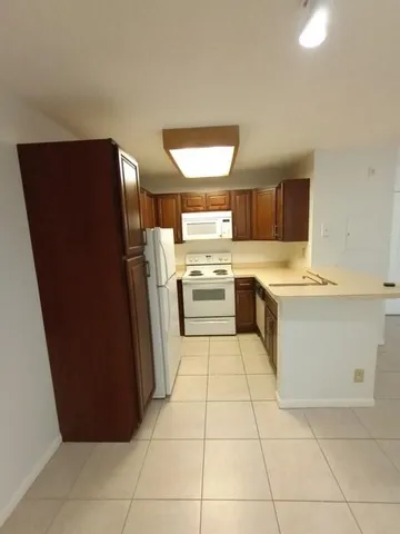 a utility room with washer and dryer
