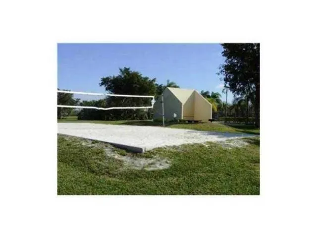 a view of a living room and bathroom