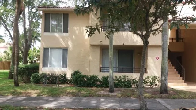 a car parked in front of a houses