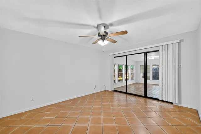 a bathroom with a shower and a bath tub