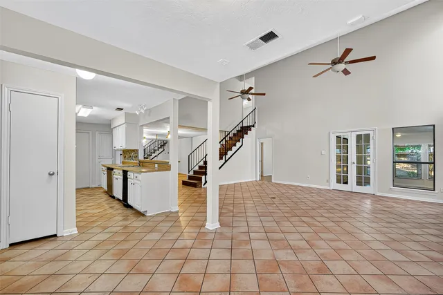a view of entryway and hall with a bath tub