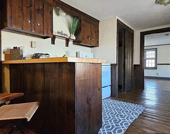 a kitchen with stainless steel appliances a refrigerator and sink
