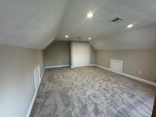 an empty room with a natural light