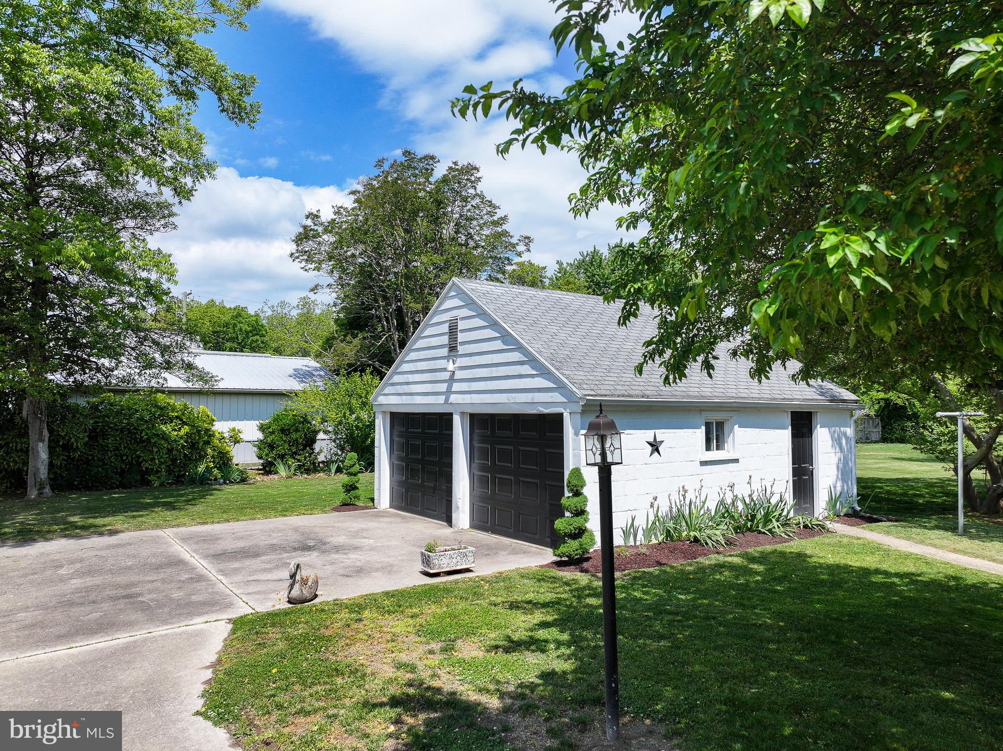 207 Crusader Road Cambridge, MD 21613 - Photo 73 of 76 a front view of a house with yard and green space