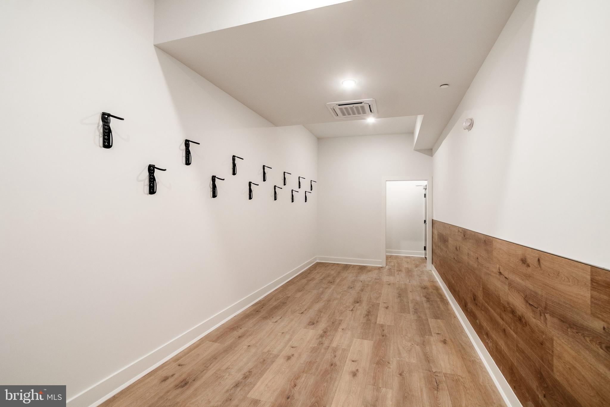 1439 Federal Street, Unit 211 Philadelphia, PA 19146 - Photo 15 of 21 a view of a room with wooden floor