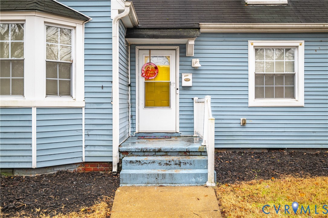 1311 Williamsburg Road Richmond, VA 23231 - Photo 3 of 38 Light blue horizontal siding exterior featuring a