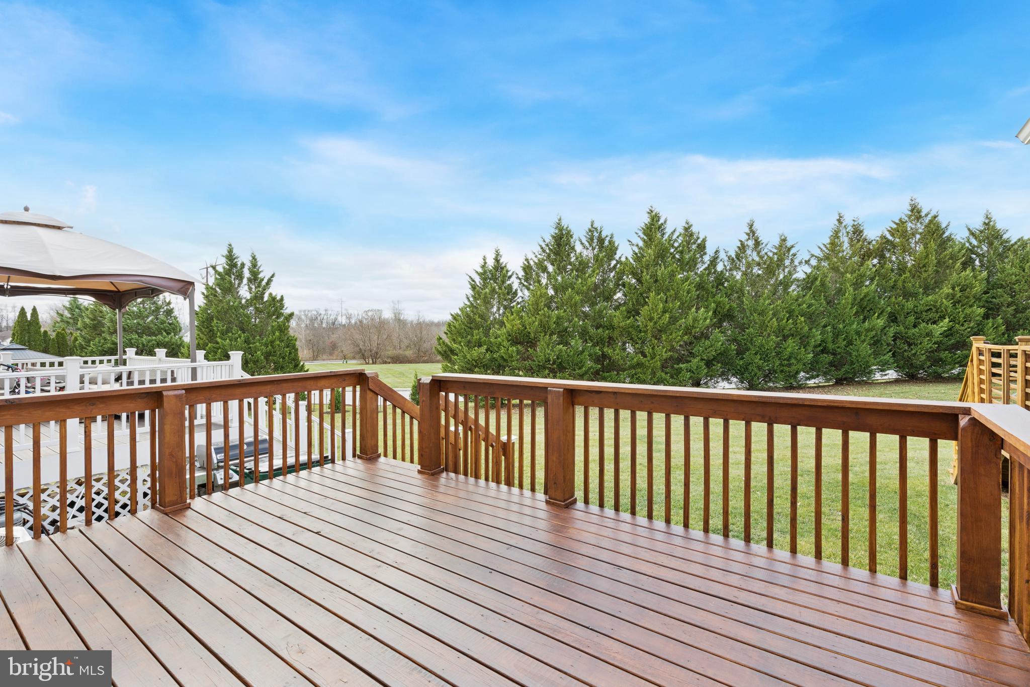 615 Longwood Road Collegeville, PA 19426 - Photo 23 of 25 a balcony with wooden floor and fence