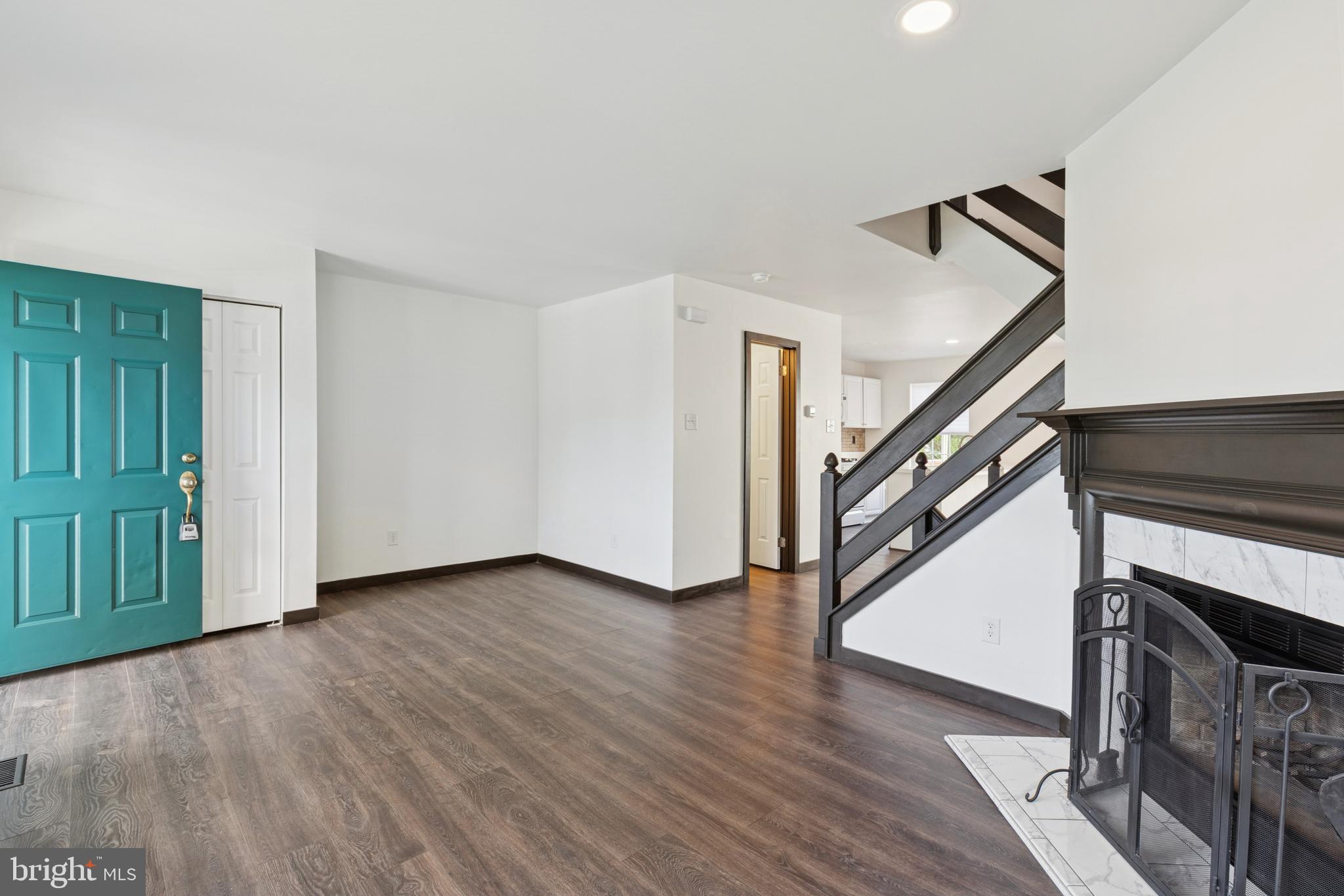 615 Longwood Road Collegeville, PA 19426 - Photo 5 of 25 a view of an entryway with wooden floor and stairs
