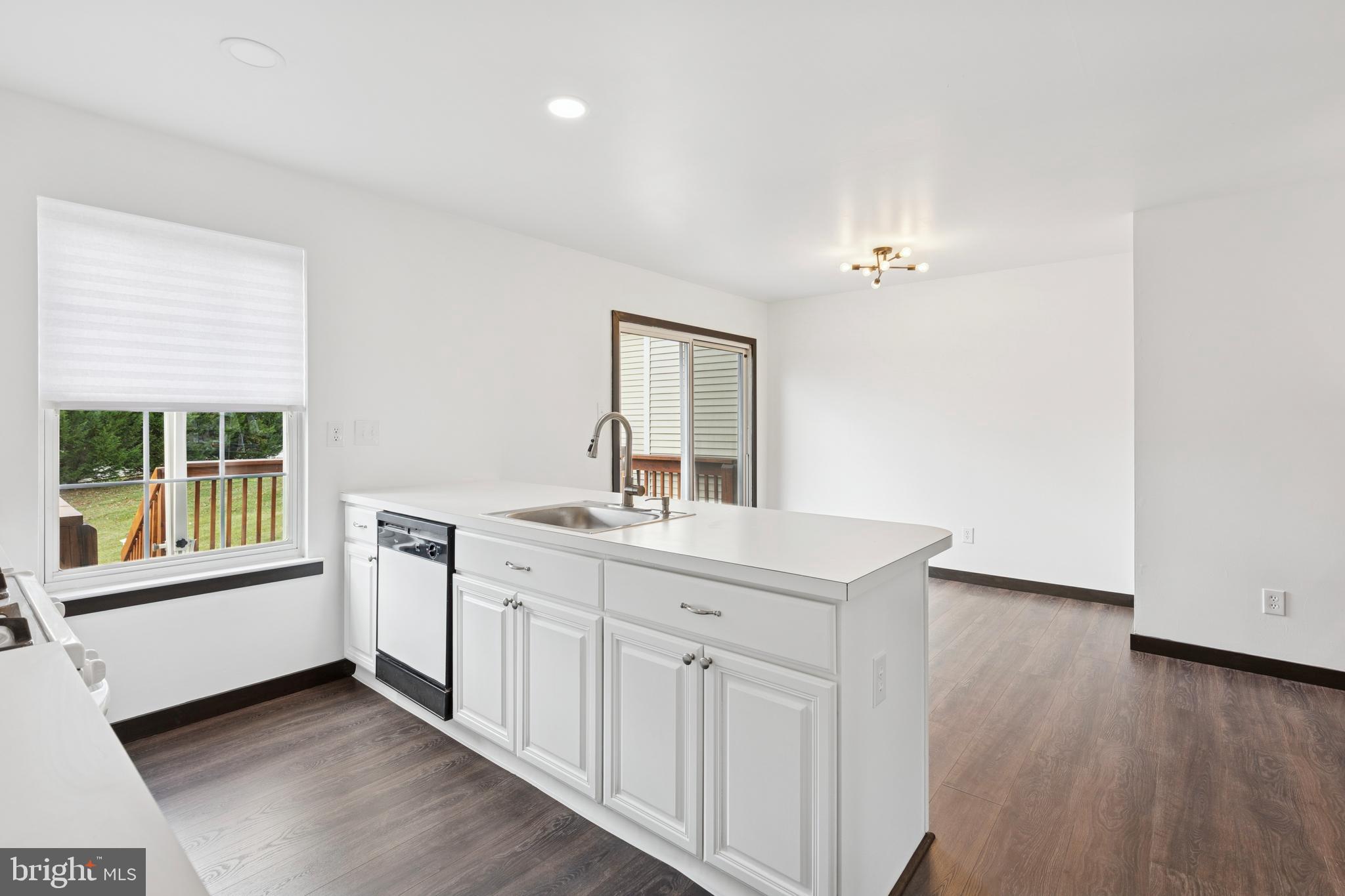 615 Longwood Road Collegeville, PA 19426 - Photo 8 of 25 a spacious bathroom with a sink and a mirror
