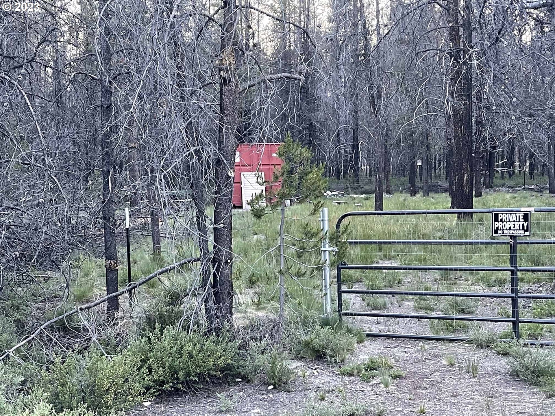 Priday Loop, Unit 23 Chiloquin, OR 97624 - Photo 8 of 21 a sign that is on the side of a road
