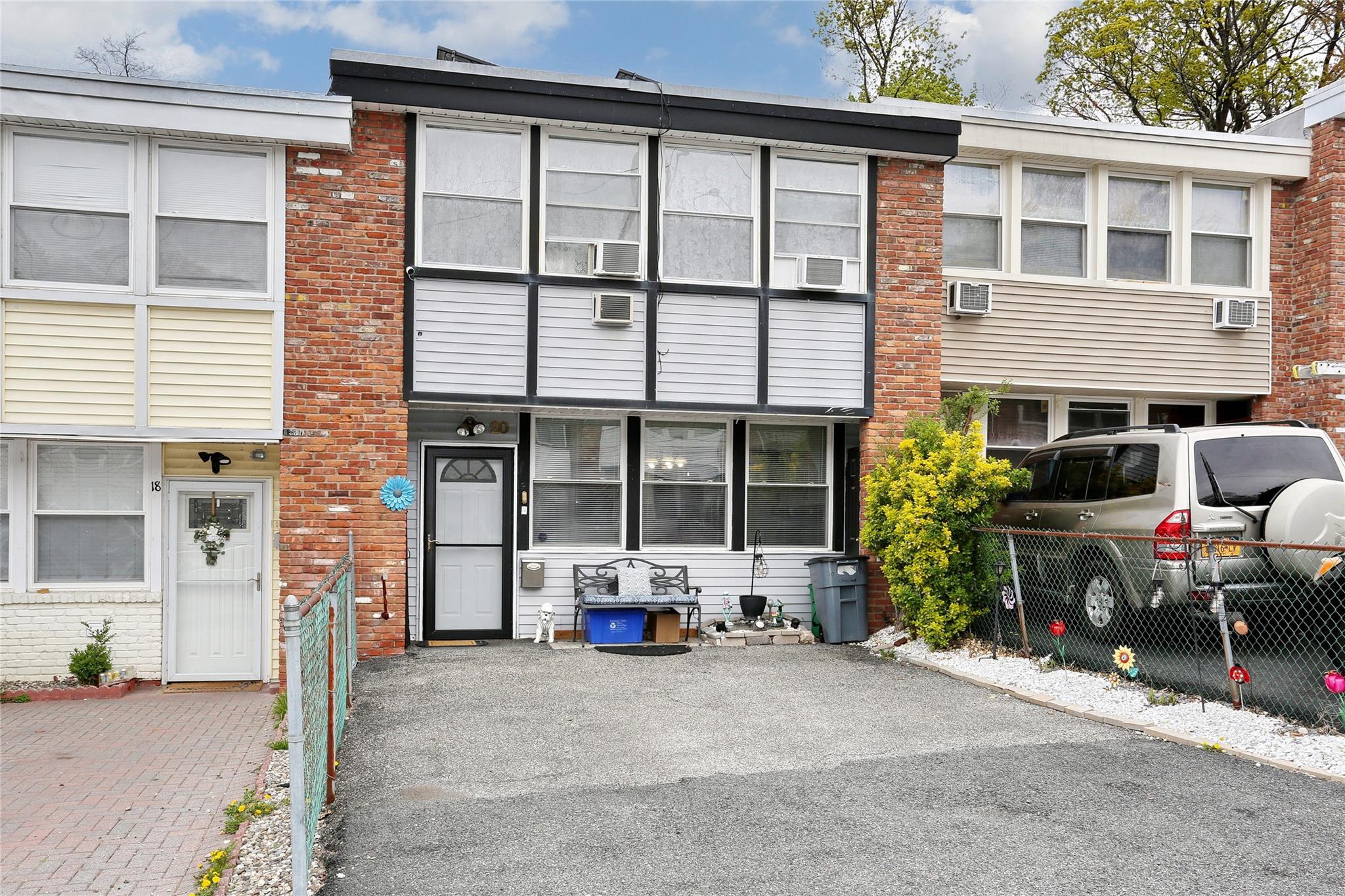 a car parked in front of a house