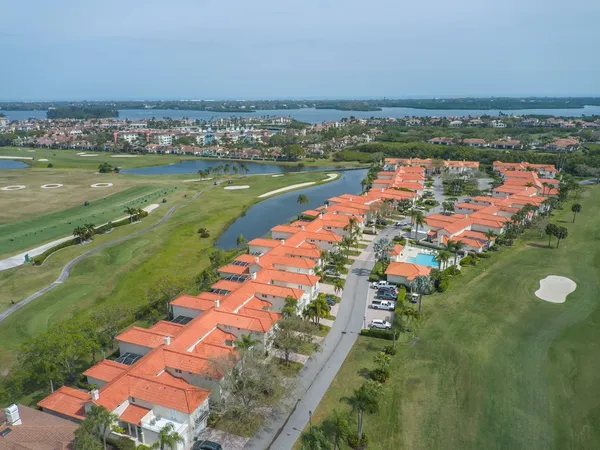 a view of a city with an ocean