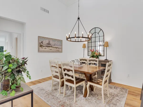 a view of a dining room with furniture