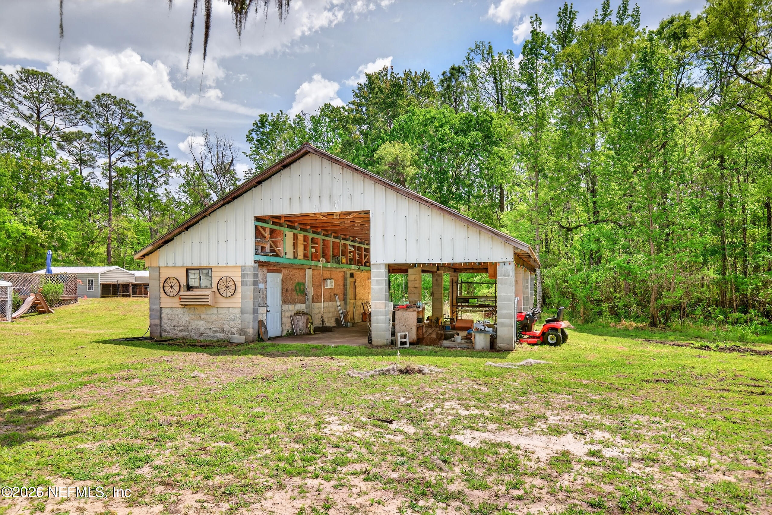 43122 Pineridge Drive Callahan, FL 32011 - Photo 4 of 46 a view of a house with backyard