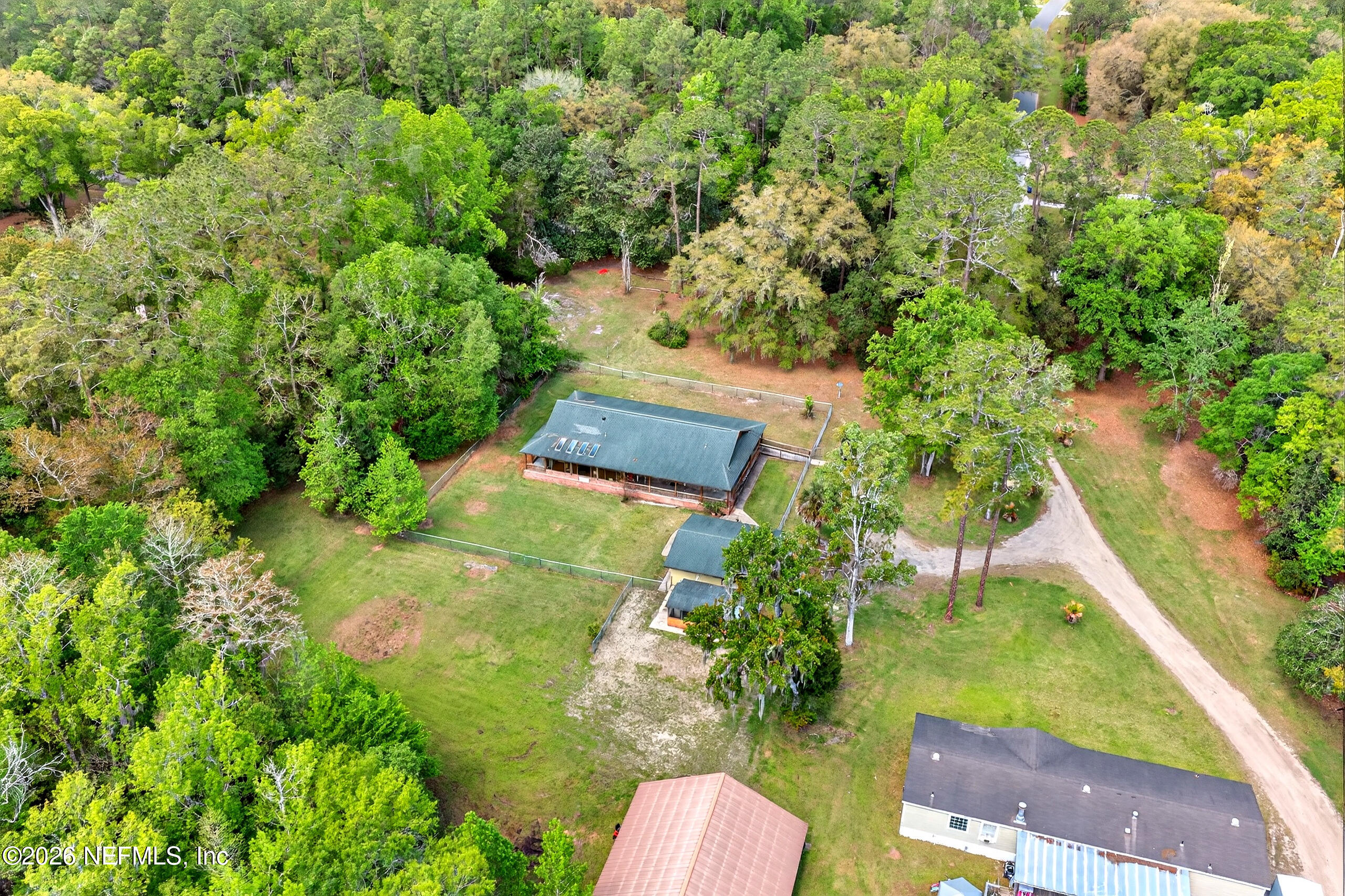 43122 Pineridge Drive Callahan, FL 32011 - Photo 43 of 46 an aerial view of residential house with outdoor space
