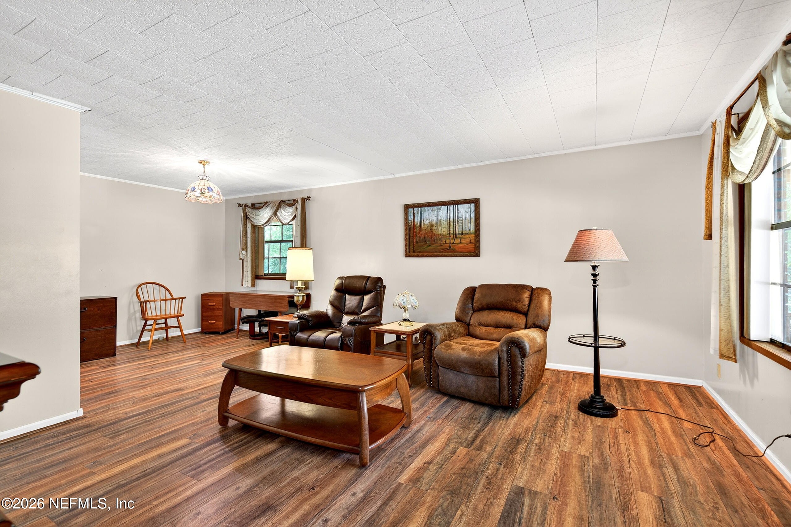 43122 Pineridge Drive Callahan, FL 32011 - Photo 7 of 46 a living room with furniture and a wooden floor