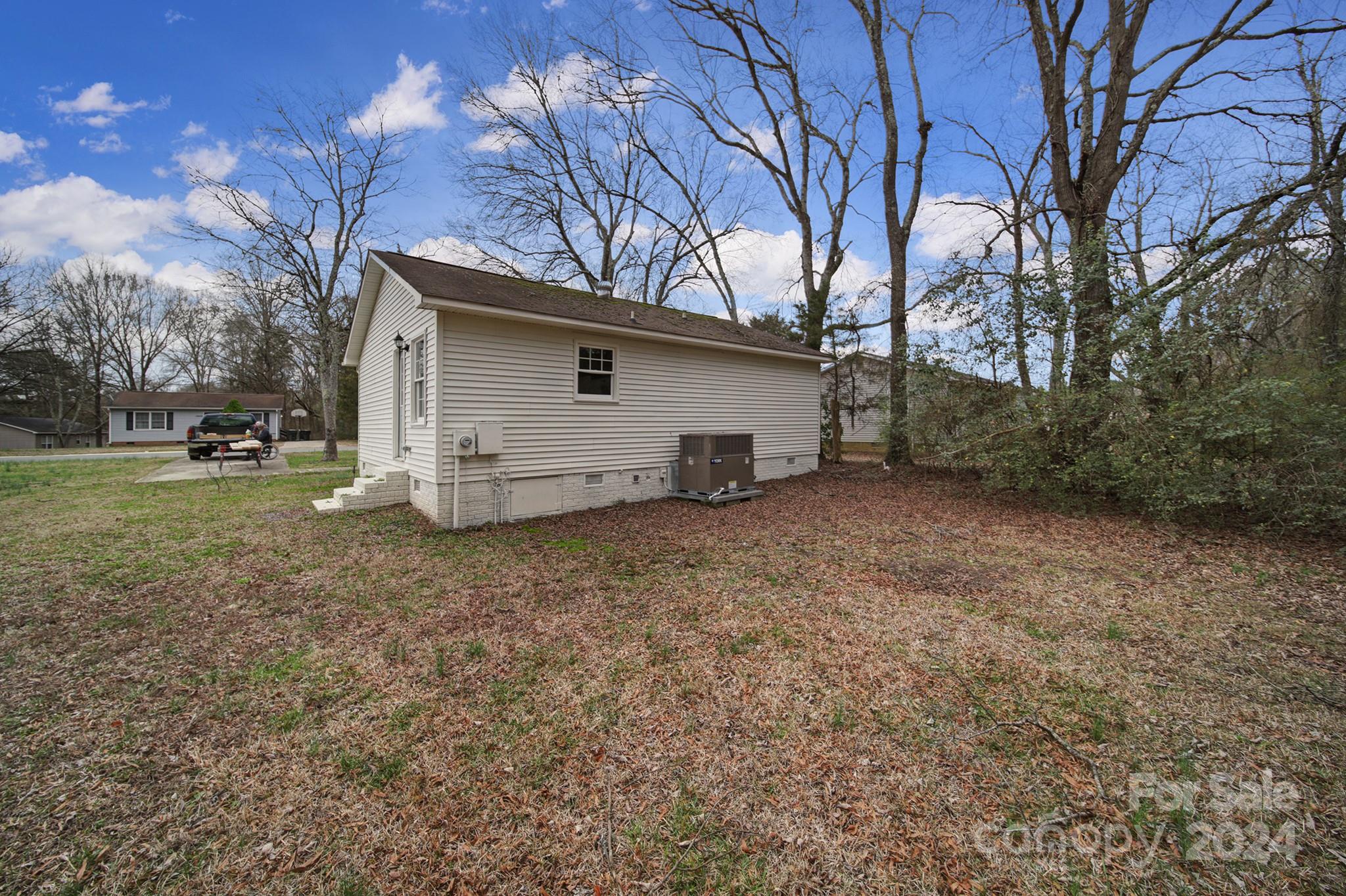 1958 Gilmore Road Rock Hill, SC 29730 - Photo 4 of 7 a view of a house with a backyard