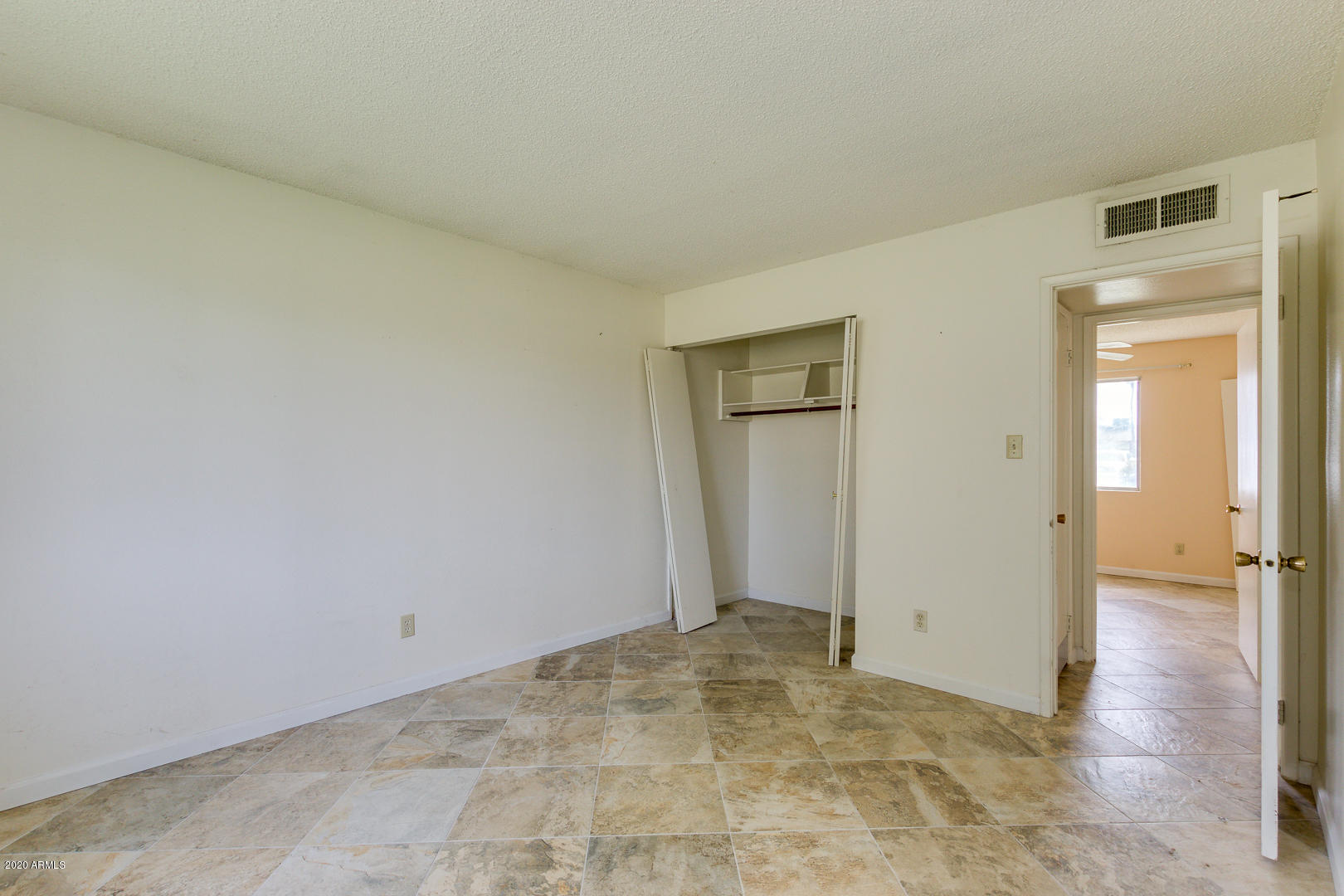 3210 West Calavar Road Phoenix, AZ 85053 - Photo 17 of 29 Master bedroom