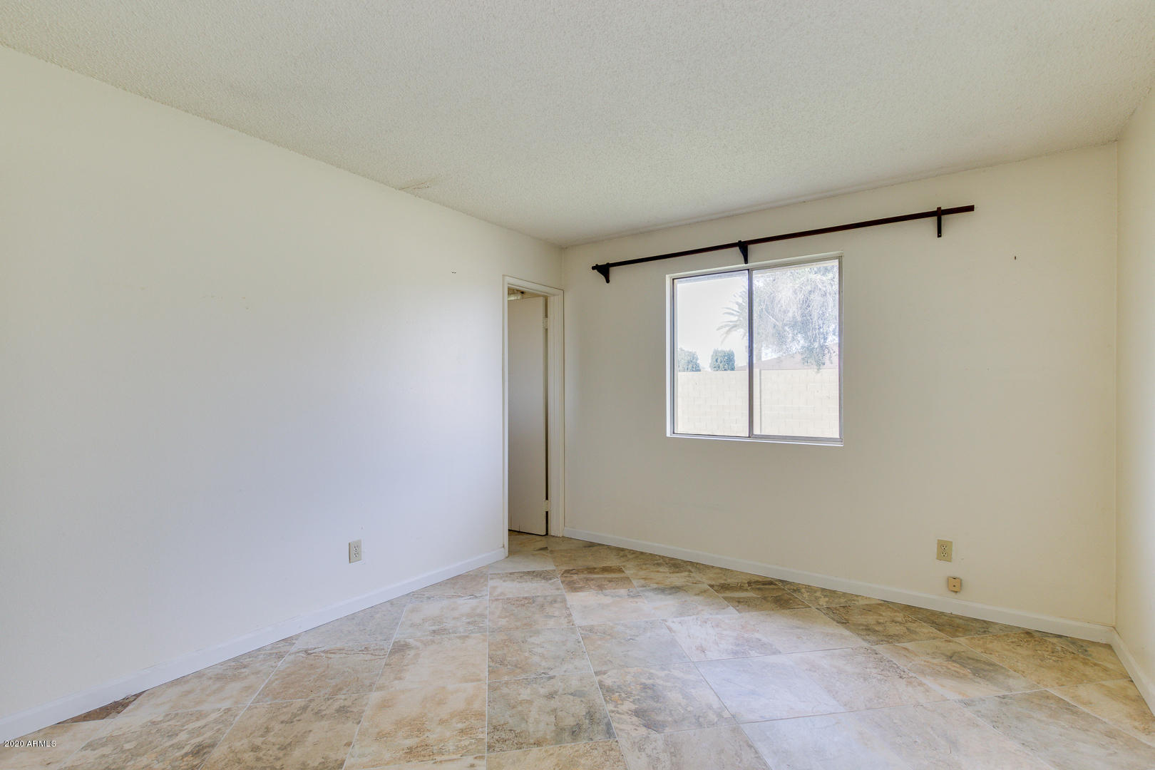 3210 West Calavar Road Phoenix, AZ 85053 - Photo 18 of 29 Master bedroom