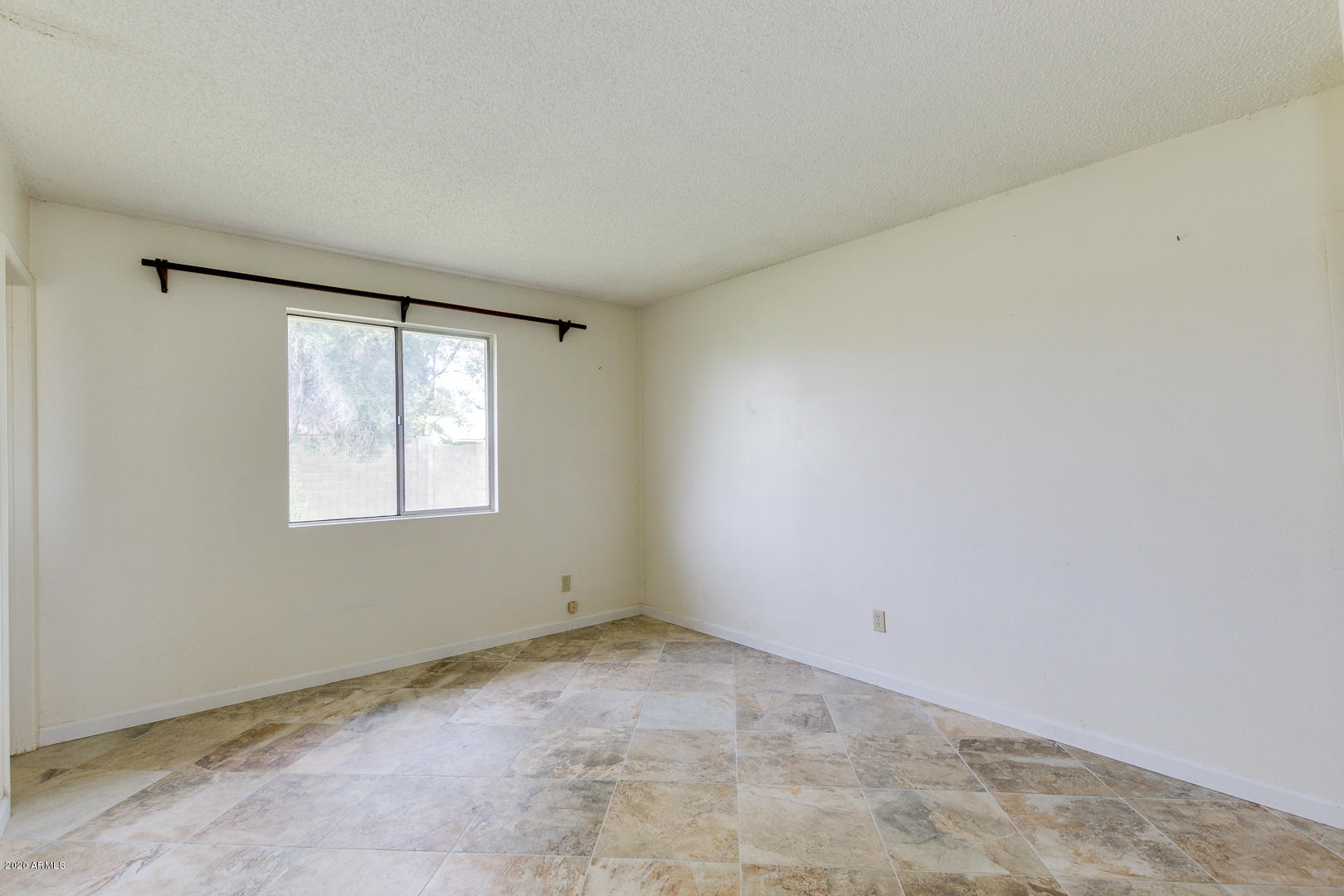 3210 West Calavar Road Phoenix, AZ 85053 - Photo 19 of 29 Master bedroom