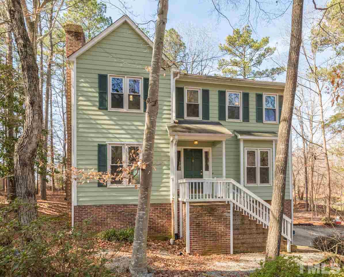 a front view of a house with a porch