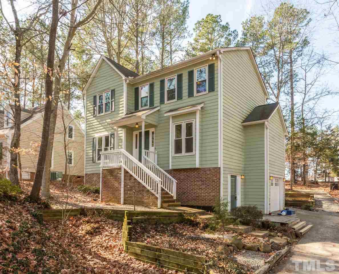 307 Winterberry Ridge Drive Durham, NC 27713 - Photo 2 of 19 a view of a house with a yard