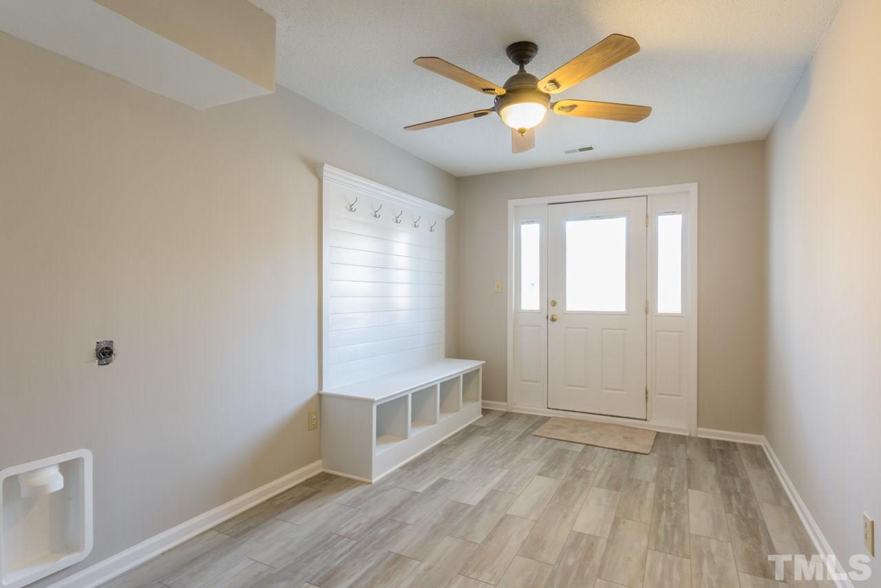 307 Winterberry Ridge Drive Durham, NC 27713 - Photo 15 of 19 wooden floor in an empty room with a window