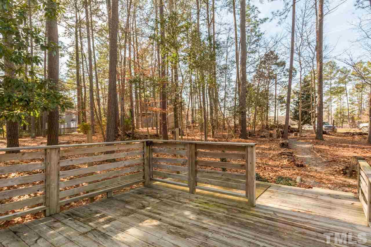 307 Winterberry Ridge Drive Durham, NC 27713 - Photo 18 of 19 a view of outdoor space with deck and living room
