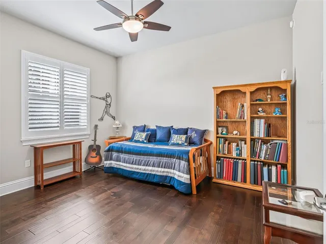 a white stove top oven sitting inside of a kitchen