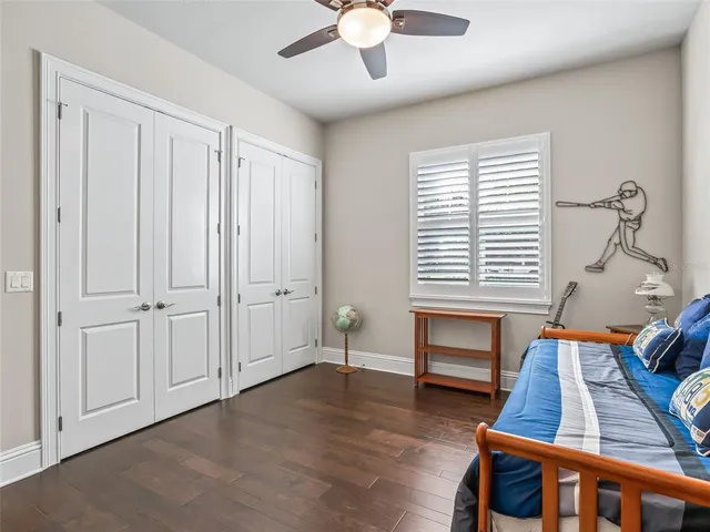 a view of a chairs and table in patio with a yard