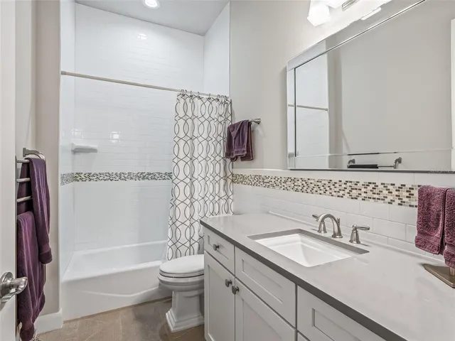 a small view of a swimming pool with a patio