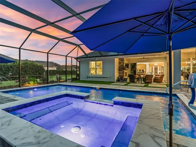 an aerial view of a house with a garden