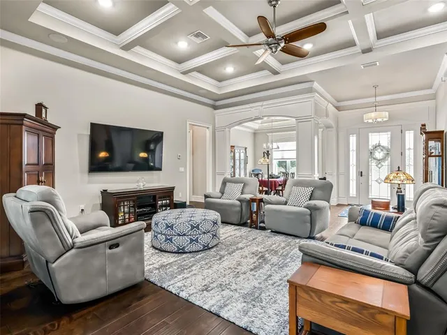 a kitchen with stainless steel appliances granite countertop a sink and a stove