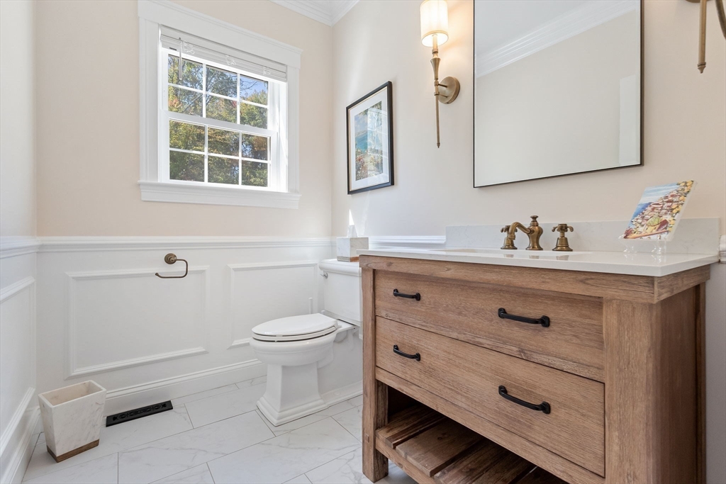 47 Fiske Mill Road Upton, MA 01568 - Photo 18 of 38 a bathroom with a toilet sink and mirror