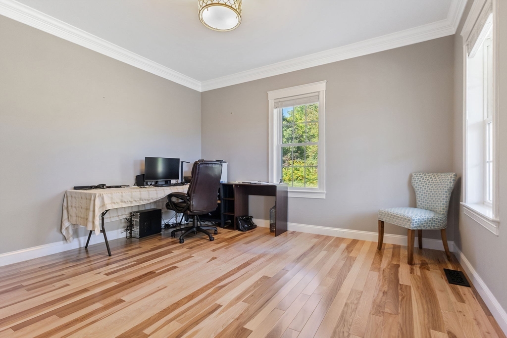 47 Fiske Mill Road Upton, MA 01568 - Photo 20 of 38 a view of a workspace with furniture and a window