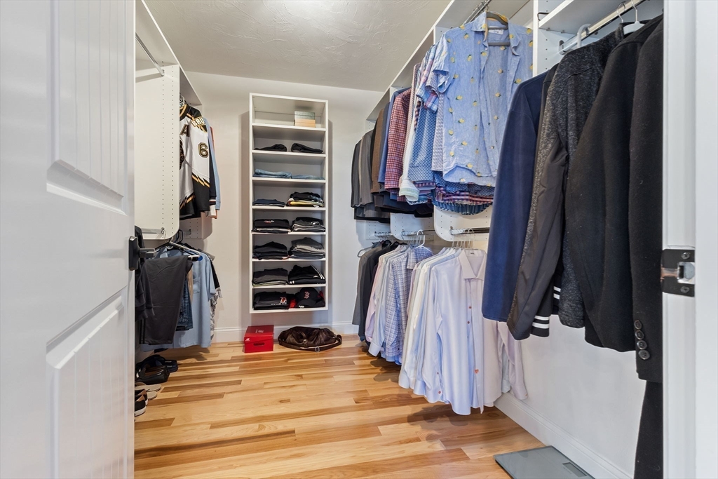 47 Fiske Mill Road Upton, MA 01568 - Photo 26 of 38 a view of walk in closet with clothes and shoes