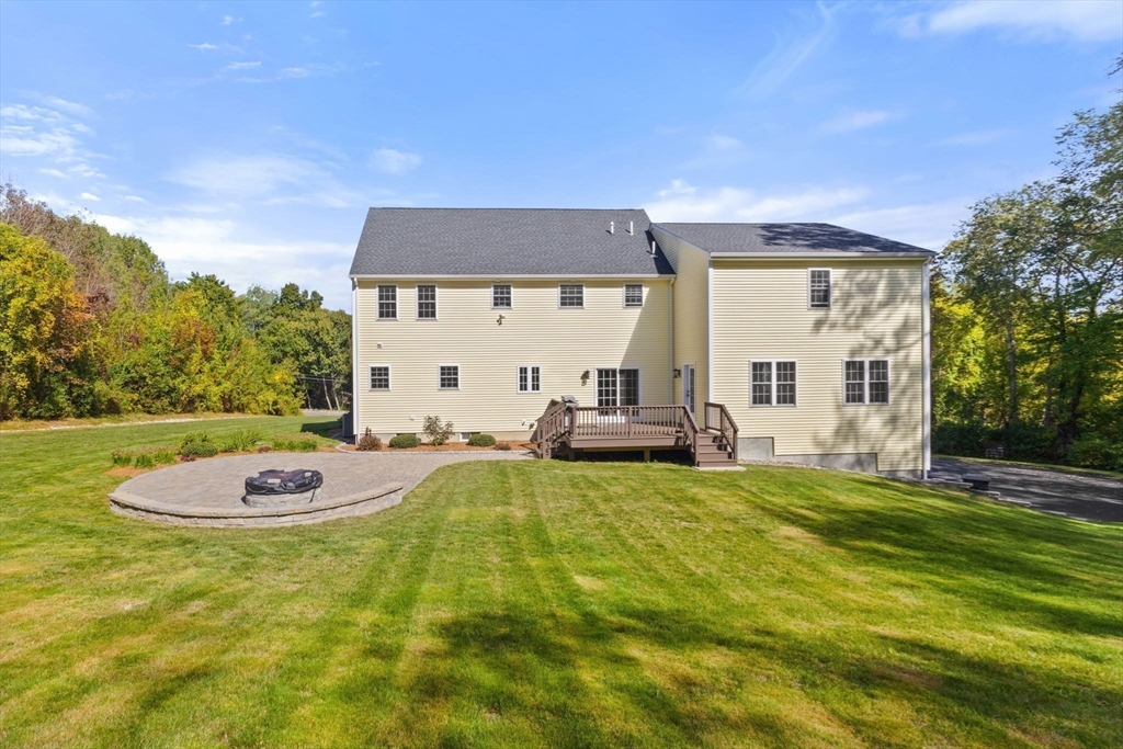 47 Fiske Mill Road Upton, MA 01568 - Photo 36 of 38 a view of a house with backyard and a garden