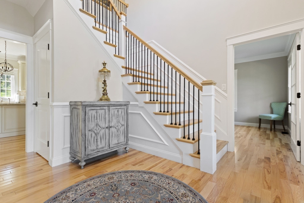 47 Fiske Mill Road Upton, MA 01568 - Photo 7 of 38 a view of entryway with wooden floor and a front door