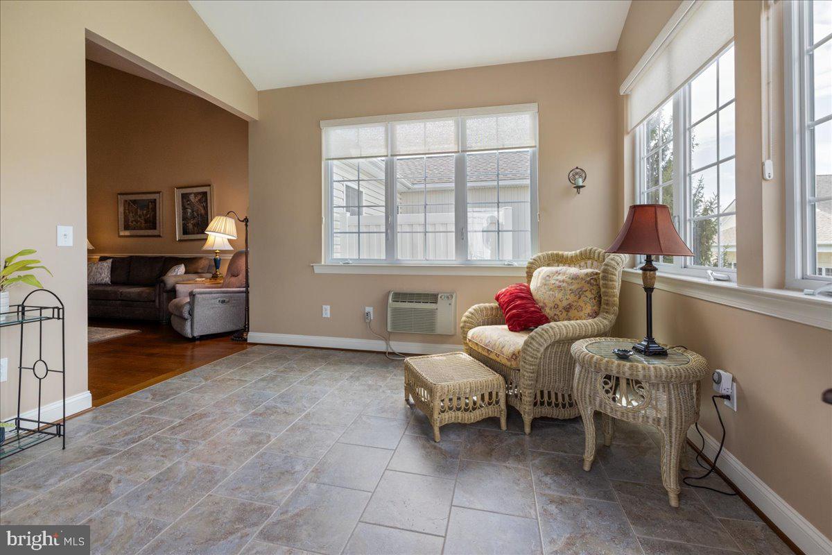 327 Melbourne Way Souderton, PA 18964 - Photo 15 of 44 a living room with furniture and a window