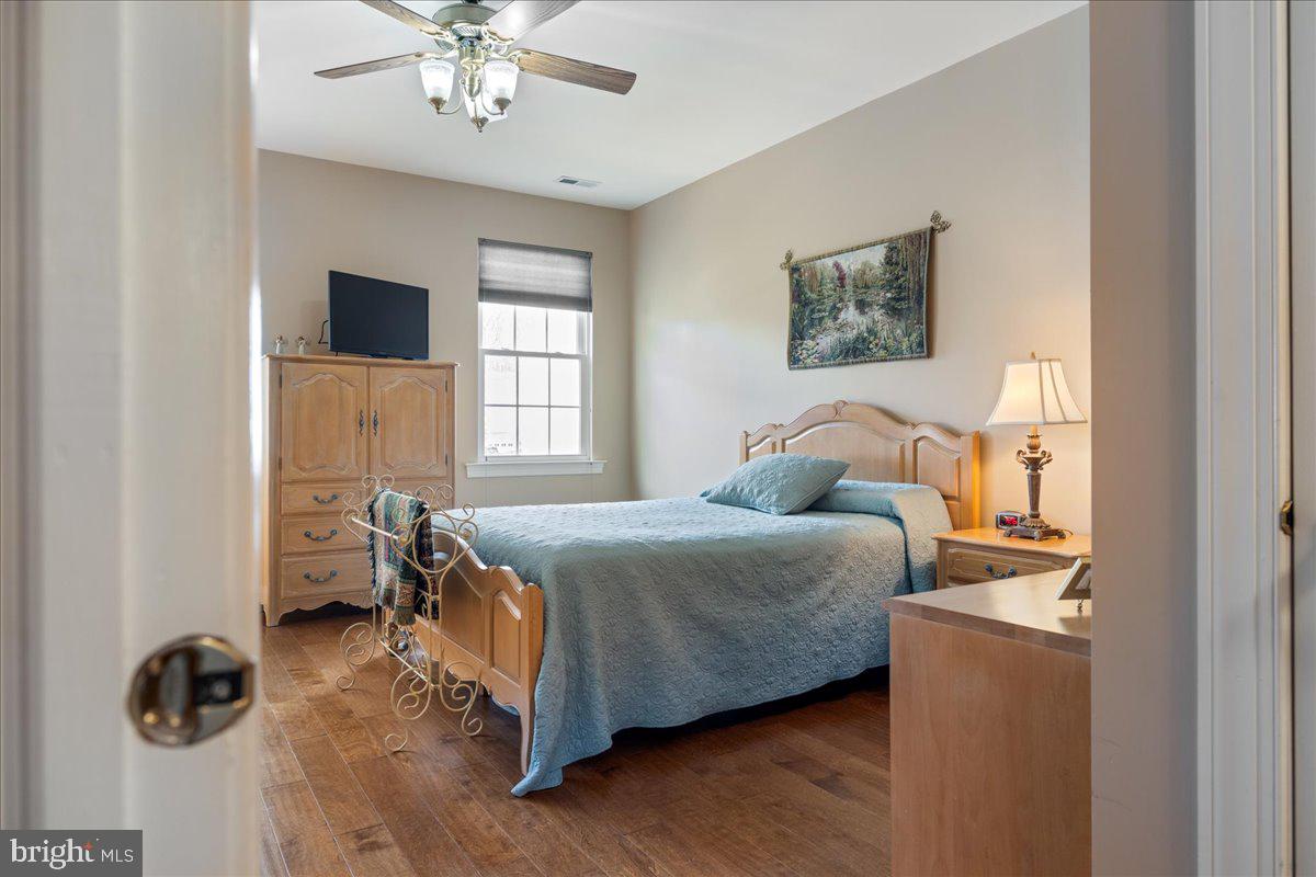 327 Melbourne Way Souderton, PA 18964 - Photo 17 of 44 a bedroom with a bed and window