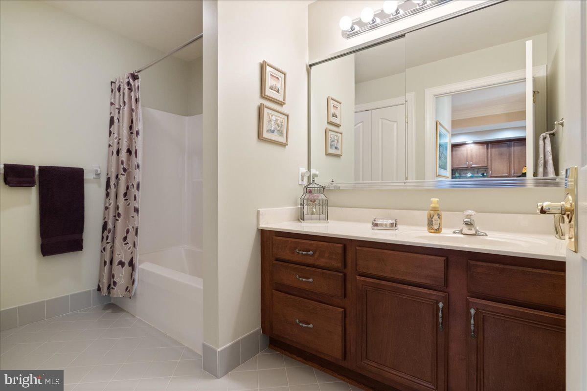 327 Melbourne Way Souderton, PA 18964 - Photo 24 of 44 a bathroom with a double vanity sink and mirror