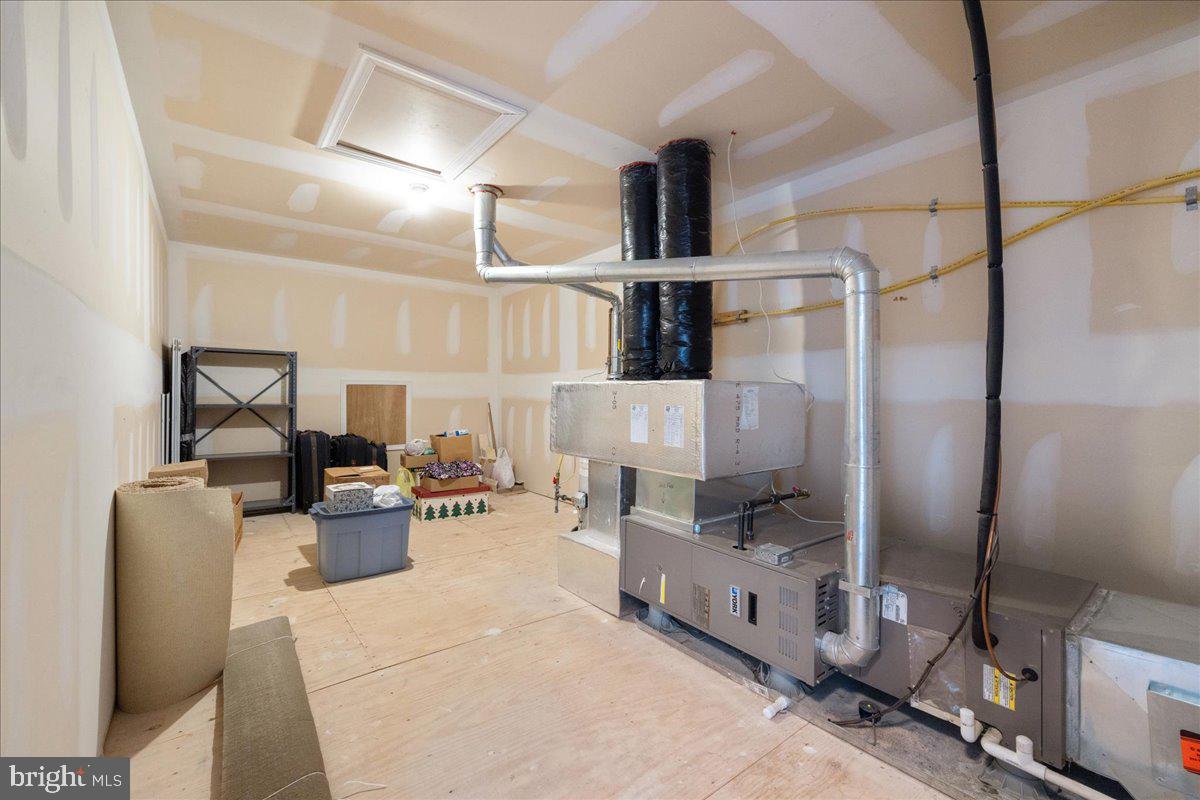 327 Melbourne Way Souderton, PA 18964 - Photo 28 of 44 a living room with furniture and a flat screen tv