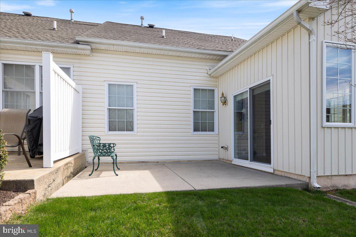 327 Melbourne Way Souderton, PA 18964 - Photo 30 of 44 a view of a backyard with chairs
