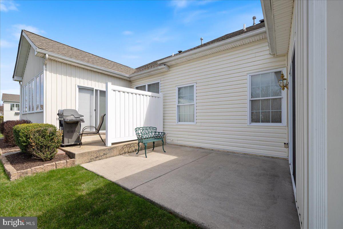 327 Melbourne Way Souderton, PA 18964 - Photo 31 of 44 a view of a patio with a table and chairs
